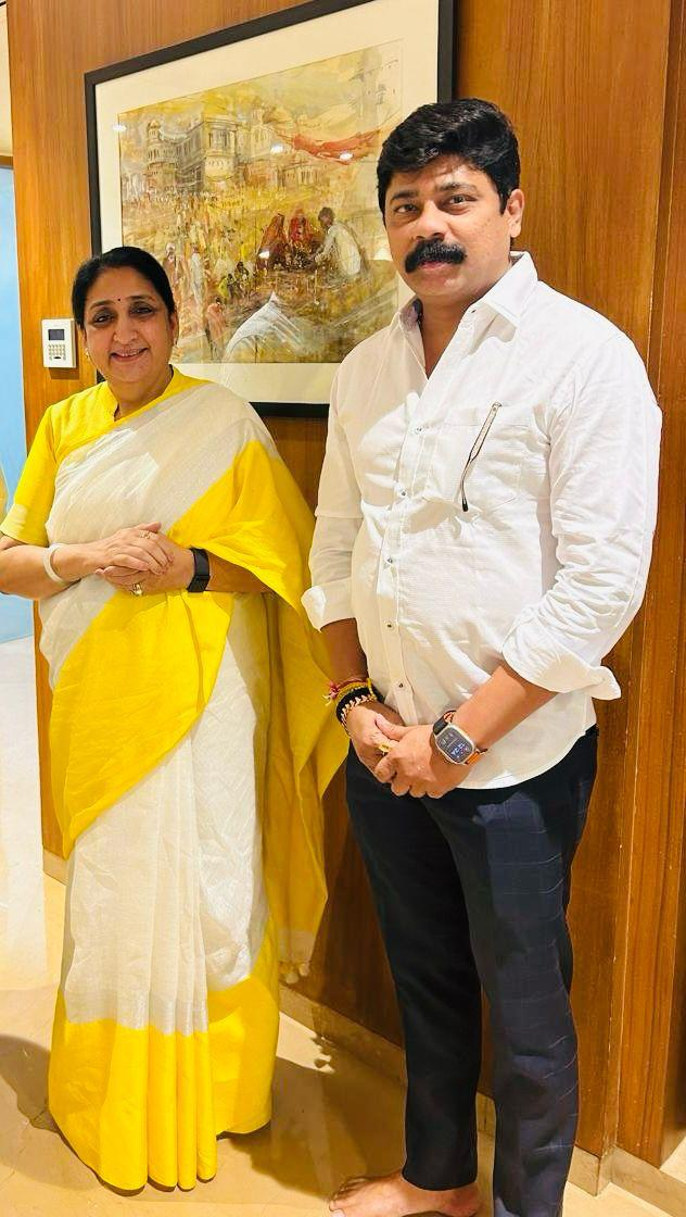 With Sunetra Pawar